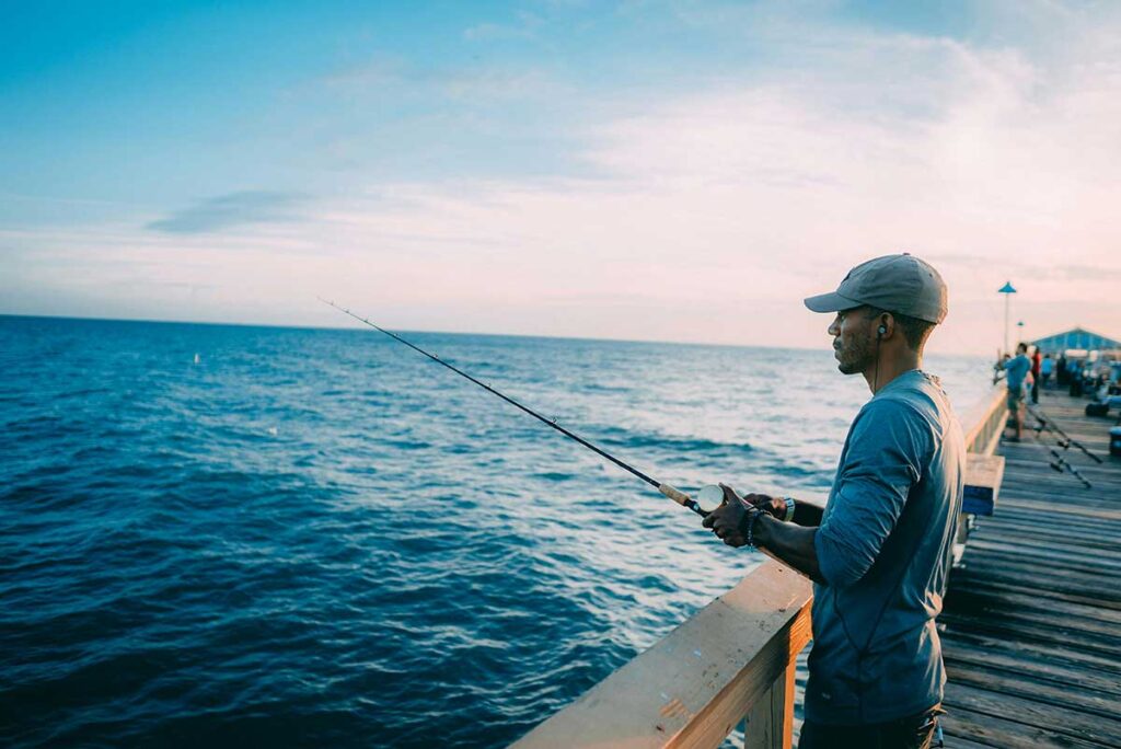 Man fishing from a pier in Florida